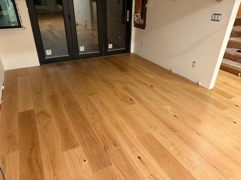 Glue-down hardwood flooring installed by Craftbuild in Vancouver